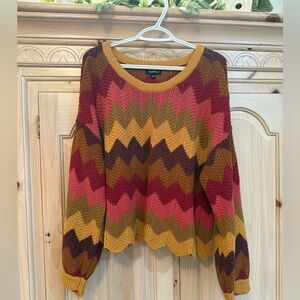 Known Supply Size M Chevron sweater.